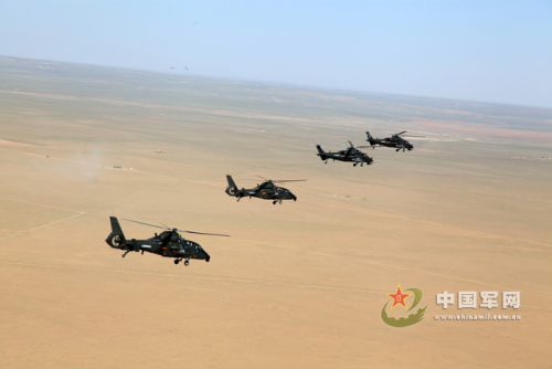 北京军区某陆航团直-10、直-19武装直升机正在进行训练。黄维摄 北京军区某陆航团直-10、直-19武装直升机正在进行训练。黄维摄
